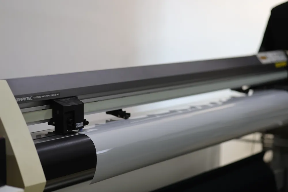 Plotter cutting a paint protection film pattern