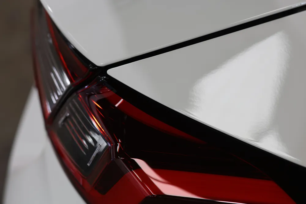 Tail light detail under film
